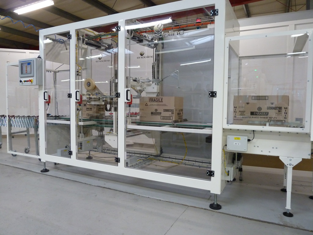 boxes of various sizes moving through the new endoline 744 random case taper at a speed of 30 cases per minute.