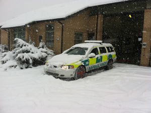 autosock fitted to ambulancecar in snow autosock fitted to ambulancecar in snow