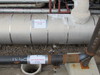 a section of the original 24” pipe used to supply steam to the johnson matthey facility (top), and the 6” pipe installed to replace it
