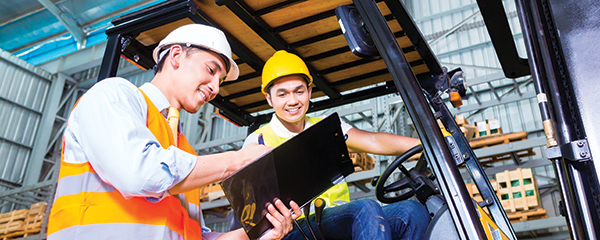 operator and supervisor with clipboard