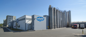 Food firm deploys AGV shuttle and reach truck combination